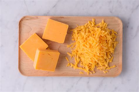 How does Sharp Cheddar Cheese fit into your Daily Goals - calories, carbs, nutrition