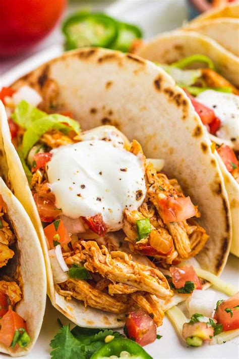 How does Shredded Chicken Tacos (2 each) fit into your Daily Goals - calories, carbs, nutrition