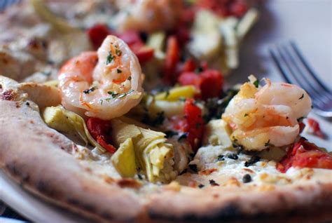 How does Shrimp Artichoke and Feta Pizza fit into your Daily Goals - calories, carbs, nutrition