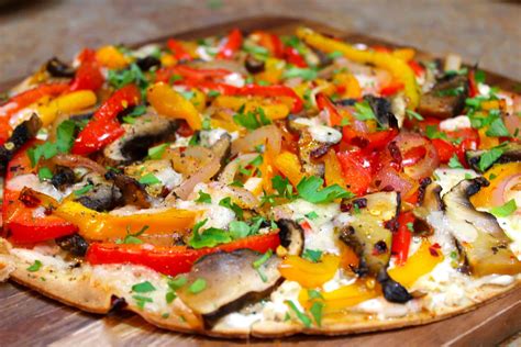 How does Single Serve Roasted Vegetable Pizza fit into your Daily Goals - calories, carbs, nutrition