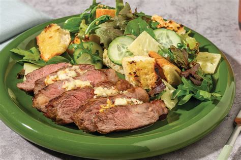 How does Sizzling Caesar Salad with Beef (1) fit into your Daily Goals - calories, carbs, nutrition