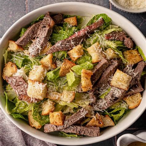 How does Sizzling Steak Caesar Salad fit into your Daily Goals - calories, carbs, nutrition