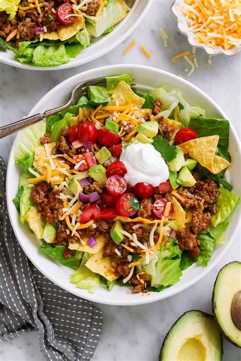 How does Sizzling Taco Chip Salad fit into your Daily Goals - calories, carbs, nutrition