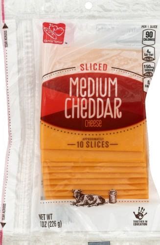 How does Sliced Medium Cheddar Cheese fit into your Daily Goals - calories, carbs, nutrition