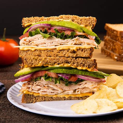 How does Sliced Turkey Swiss Sandwich fit into your Daily Goals - calories, carbs, nutrition