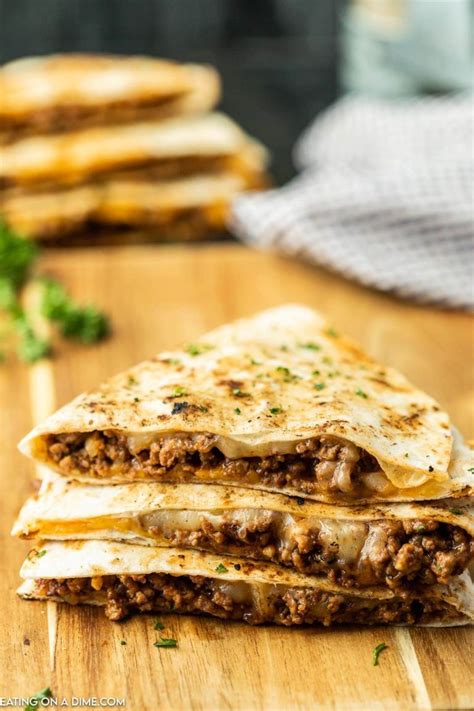 How does Sloppy Joe Quesadilla with Queso Fondue fit into your Daily Goals - calories, carbs, nutrition