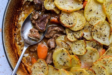 How does Slowly Braised Lamb Hot Pot with Steamed Savoy Cabbage fit into your Daily Goals - calories, carbs, nutrition