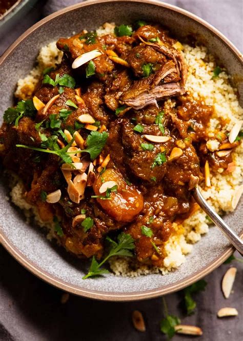 How does Slowly Cooked Lamb Tagine with Lemon, Mint & Coriander Cous Cous fit into your Daily Goals - calories, carbs, nutrition