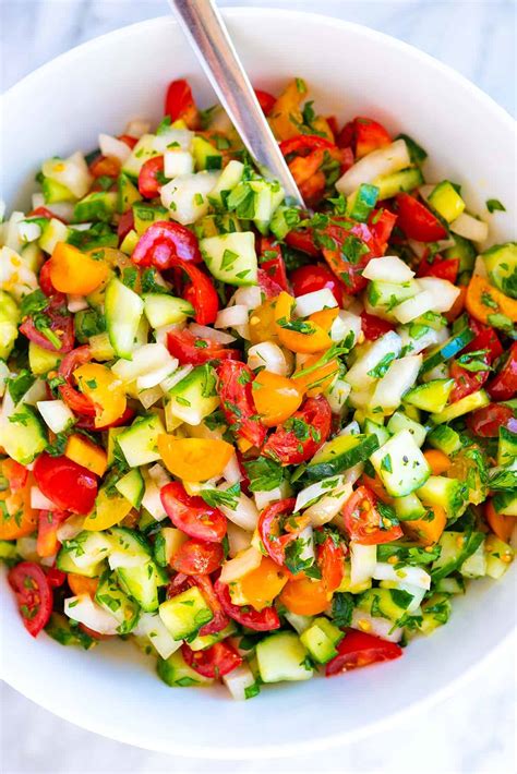 How does Small Tomato, Cucumber, Onion Salad fit into your Daily Goals - calories, carbs, nutrition