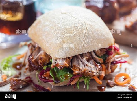 How does Smoked Pulled Pork on Ciabatta w/ Caramelized Onions Sundried Tomato Aioli fit into your Daily Goals - calories, carbs, nutrition