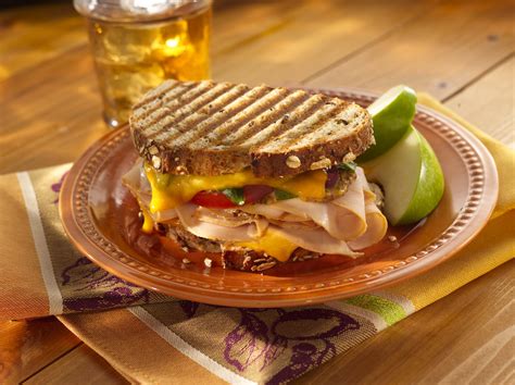 How does Smoked Turkey, Cheddar, Herb Aioli Panini fit into your Daily Goals - calories, carbs, nutrition