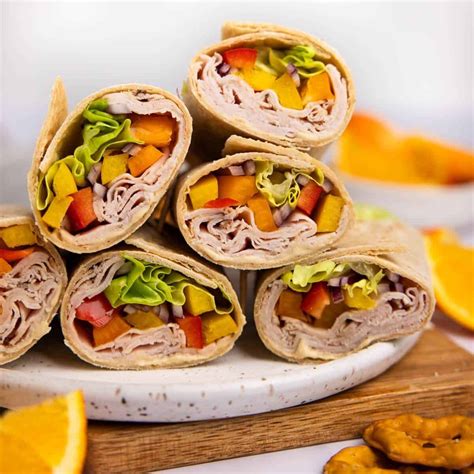 How does Smoked Turkey Hummus Wrap with Baby Carrots fit into your Daily Goals - calories, carbs, nutrition