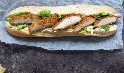 How does Southern Fried Chicken Fillet in a Sesame Bun with Iceberg & Mayonnaise fit into your Daily Goals - calories, carbs, nutrition
