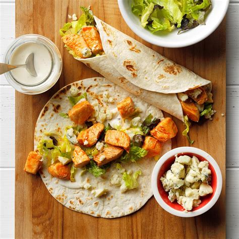 How does Spicy Buffalo Chicken Wrap - STG fit into your Daily Goals - calories, carbs, nutrition