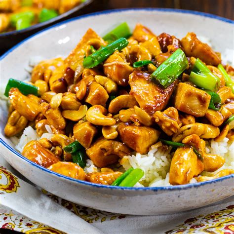 How does Spicy Cashew Chicken over rice fit into your Daily Goals - calories, carbs, nutrition