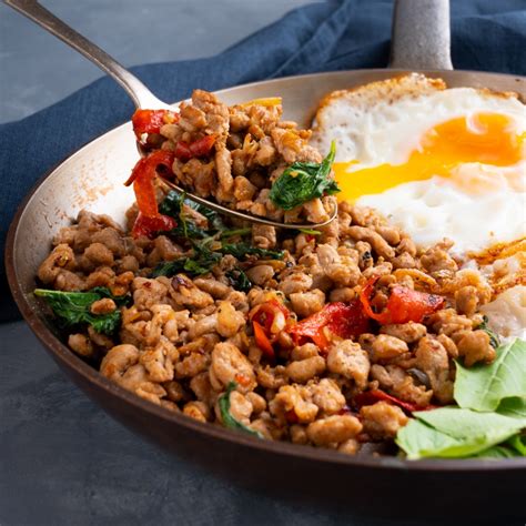 How does Spicy Pork, Egg & Cheddar Sandwich fit into your Daily Goals - calories, carbs, nutrition