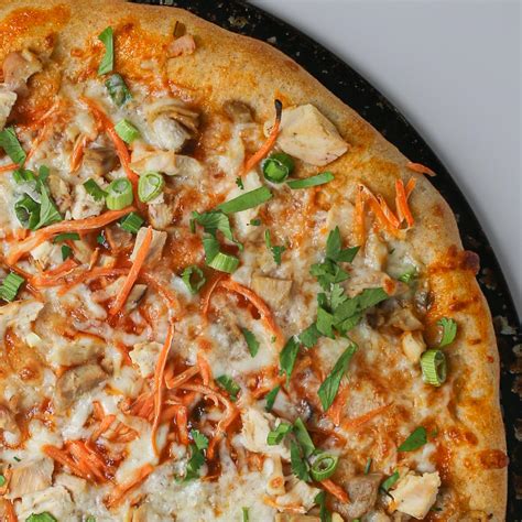 How does Spicy Thai Chicken Pizza fit into your Daily Goals - calories, carbs, nutrition