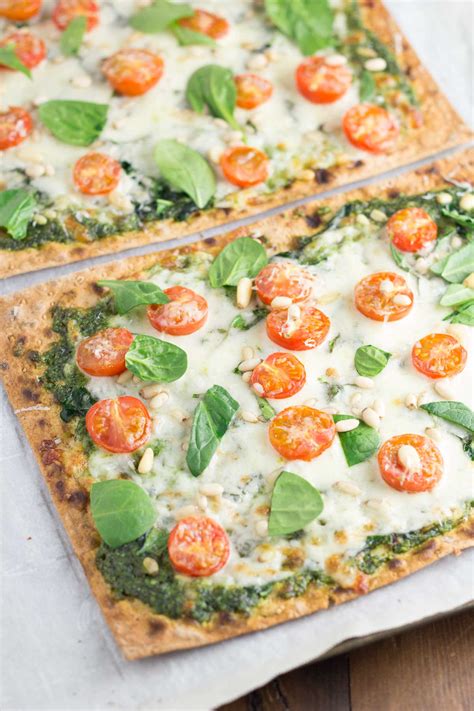 How does Spinach, Tomato, Pesto with Provolone Flatbread fit into your Daily Goals - calories, carbs, nutrition
