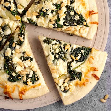 How does Spinach Feta Pizza fit into your Daily Goals - calories, carbs, nutrition