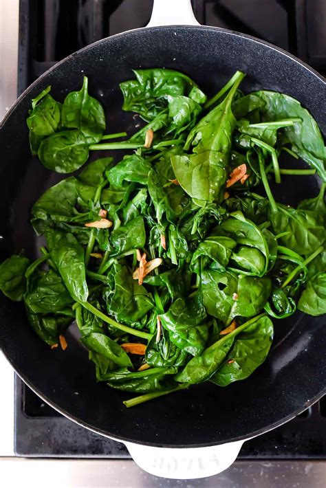 How does Spinach Frozen Leaf Garlic & Onions 4 oz fit into your Daily Goals - calories, carbs, nutrition