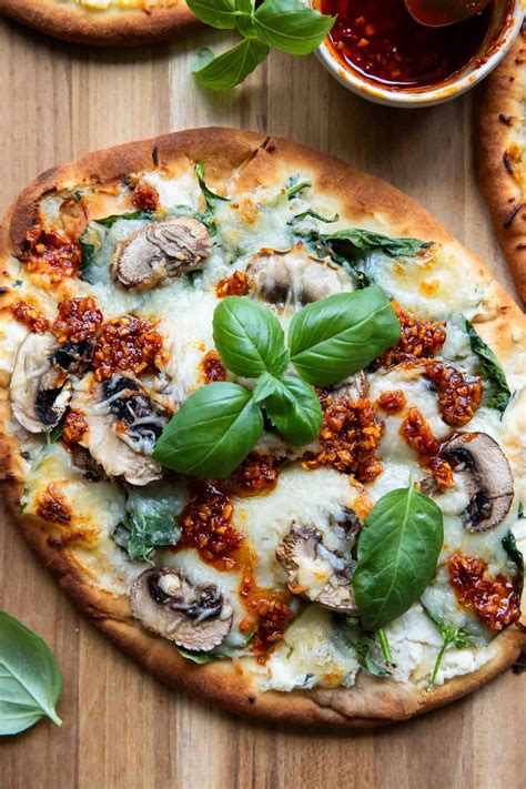 How does Spinach Mushroom Pizza fit into your Daily Goals - calories, carbs, nutrition