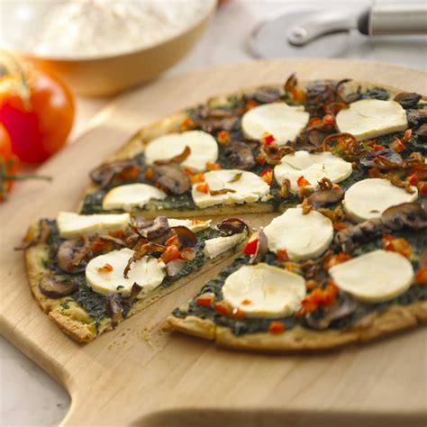 How does Spinach and Mushroom Pizza fit into your Daily Goals - calories, carbs, nutrition