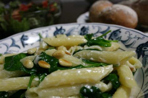How does Spinach-Feta Penne with Pine Nuts fit into your Daily Goals - calories, carbs, nutrition