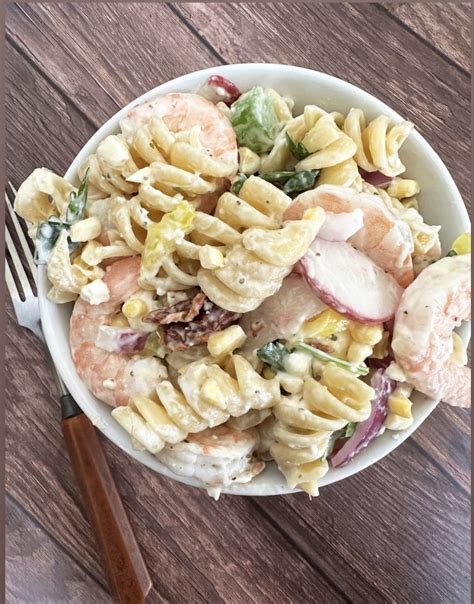 How does Spring Greens and Shrimp Pasta Salad fit into your Daily Goals - calories, carbs, nutrition