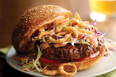 How does Sriracha Slaw Burger fit into your Daily Goals - calories, carbs, nutrition