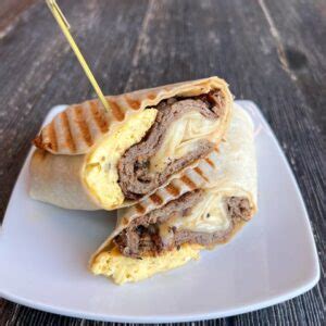 How does Steak, Egg and Cheese Wrap fit into your Daily Goals - calories, carbs, nutrition