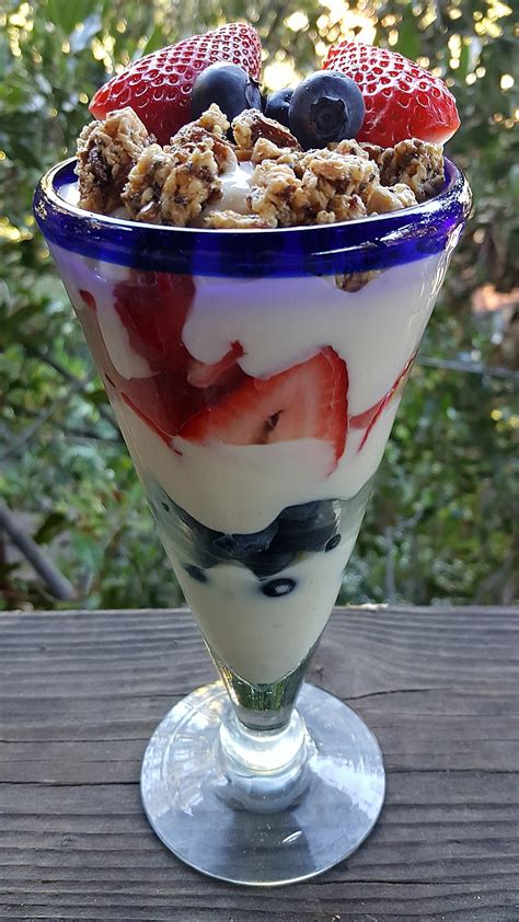 How does Strawberry-Blueberry Yogurt Parfait fit into your Daily Goals - calories, carbs, nutrition