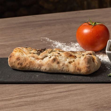 How does Stromboli Quattro Formaggi fit into your Daily Goals - calories, carbs, nutrition