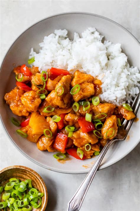 How does Sweet and Sour Chicken with Tropical Rice and Gingered Snow Peas fit into your Daily Goals - calories, carbs, nutrition