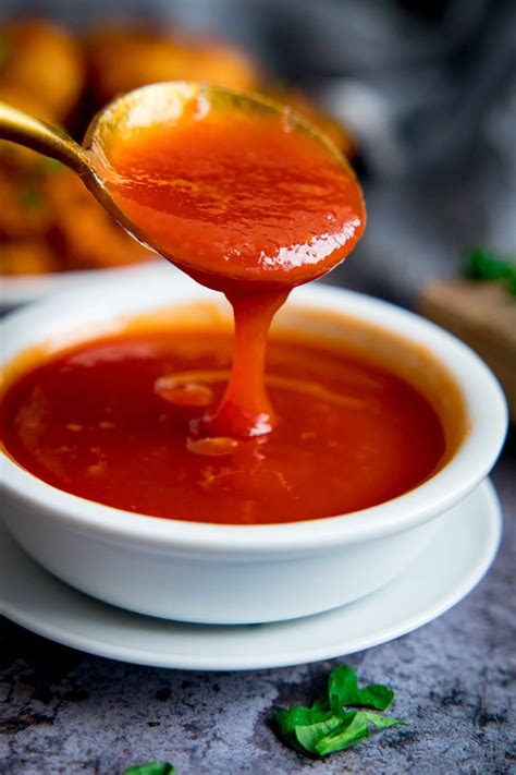 How does Sweet and Sour Sauce (61180.7) fit into your Daily Goals - calories, carbs, nutrition