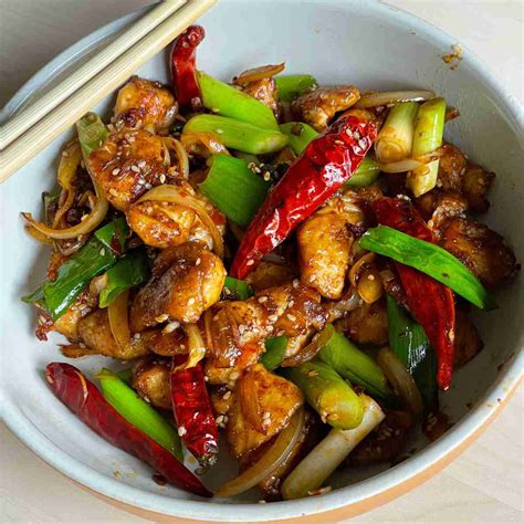 How does Szechuan Chicken with Rice and Prawn Crackers fit into your Daily Goals - calories, carbs, nutrition