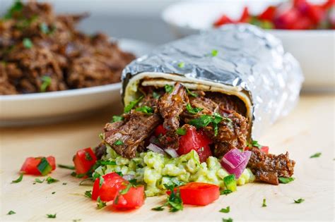 How does THab Burrito Beef Barbacoa fit into your Daily Goals - calories, carbs, nutrition