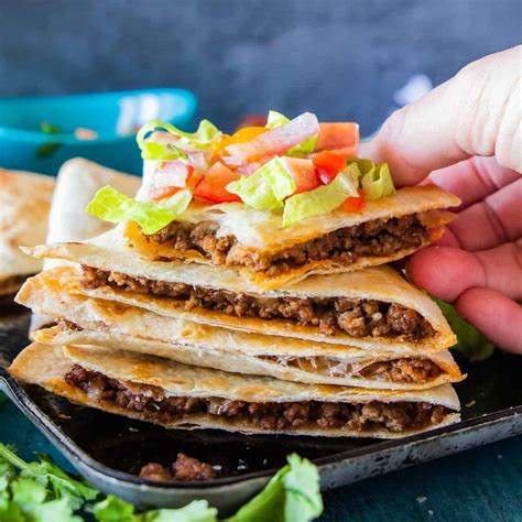How does Taco Beef Quesadilla fit into your Daily Goals - calories, carbs, nutrition