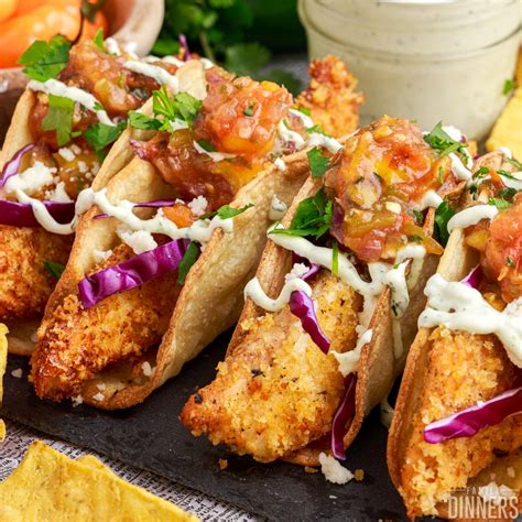 How does Taco Fish Buttermilk Fried Tilapia 2 EA fit into your Daily Goals - calories, carbs, nutrition