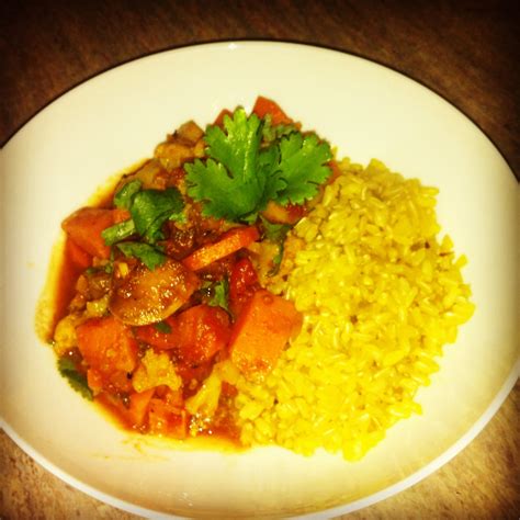 How does Tagine Coconut Beef Curry with Summer Vegetable and Saffron Brown Rice Paella fit into your Daily Goals - calories, carbs, nutrition