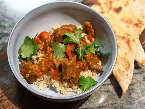 How does Tagine Coconut Beef Curry with Summer Vegetable and Saffron Rice fit into your Daily Goals - calories, carbs, nutrition