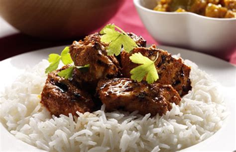 How does Tandoori Chicken with Basmati Rice fit into your Daily Goals - calories, carbs, nutrition