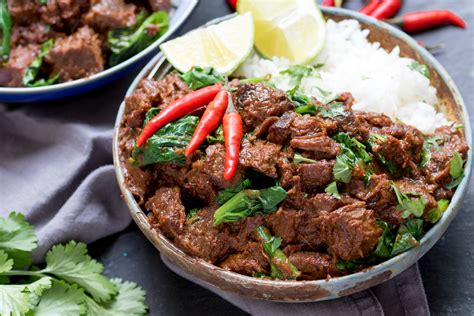 How does Tender Pieces of Beef Cooked in a Spicy Red Curry Sauce fit into your Daily Goals - calories, carbs, nutrition