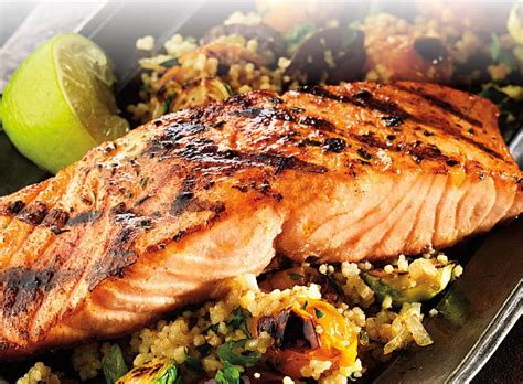 How does Teriyaki Salmon over Veggie Fried Rice fit into your Daily Goals - calories, carbs, nutrition