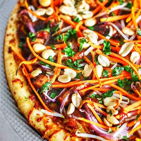 How does Thai Chicken Pizza (16118.9) fit into your Daily Goals - calories, carbs, nutrition