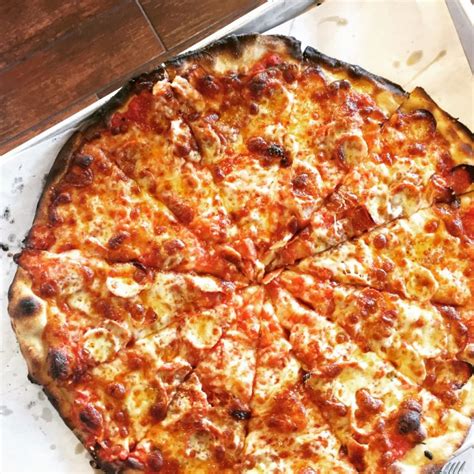 How does The New England Pizza fit into your Daily Goals - calories, carbs, nutrition