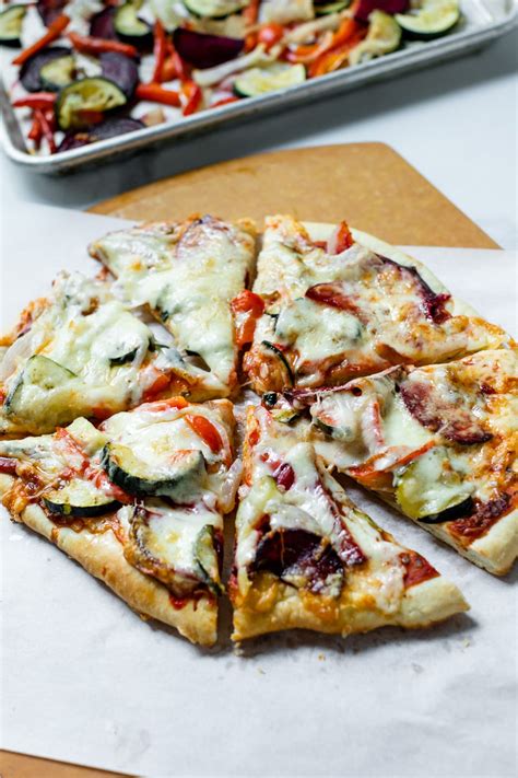 How does Thin Crust Roasted Vegetable Pizza fit into your Daily Goals - calories, carbs, nutrition