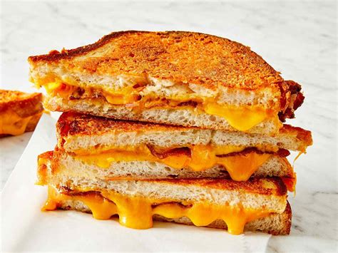 How does Three Cheese Grilled Cheese with Brie, Toma, Cheddar & Rosemary fit into your Daily Goals - calories, carbs, nutrition