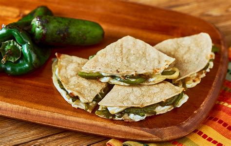 How does Three Cheese Poblano Quesadilla fit into your Daily Goals - calories, carbs, nutrition