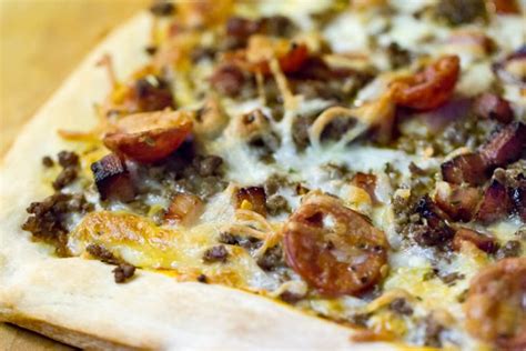 How does Three Meat Pizza fit into your Daily Goals - calories, carbs, nutrition