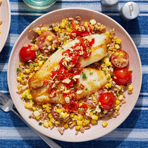 How does Tilapia Seared Hawaiian Relish & Coconut Rice fit into your Daily Goals - calories, carbs, nutrition